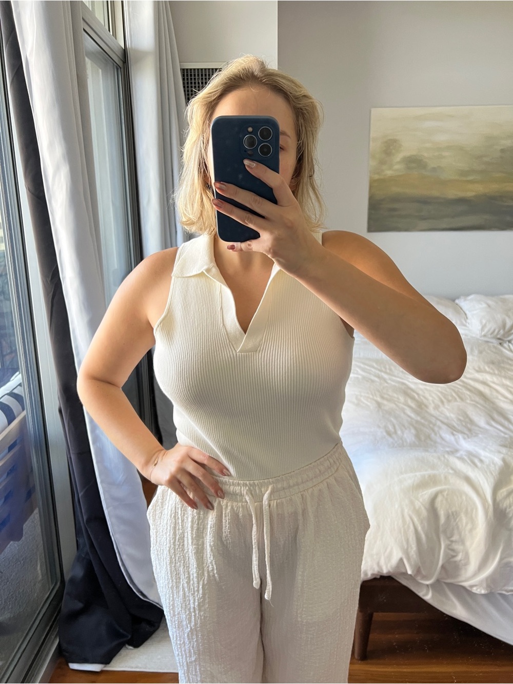 ReformationWomen's Cream Ribbed Sleeveless Polo Top
